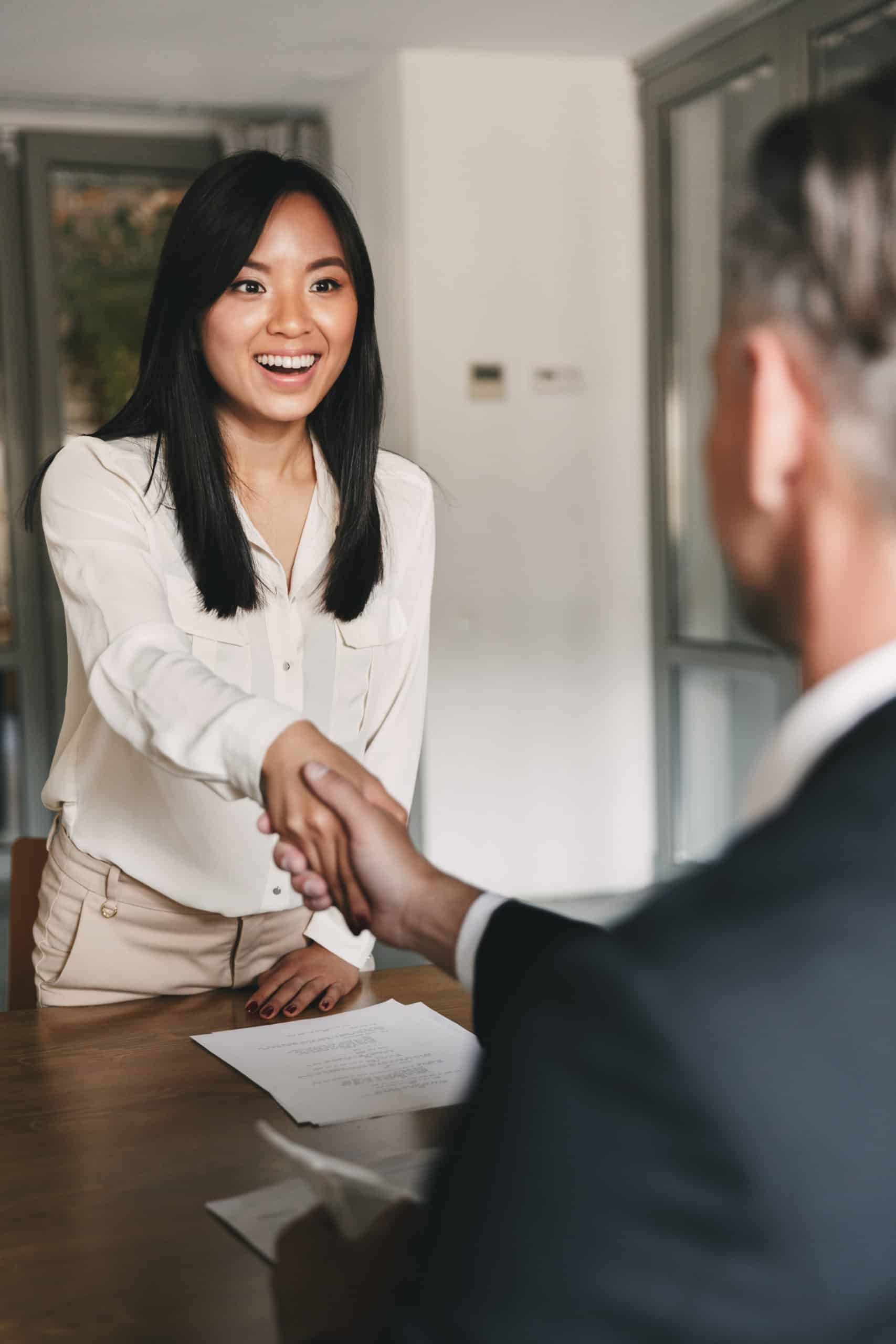 Business, career and placement concept - happy asian woman hands